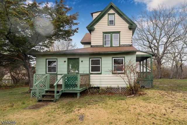 615 S New York Rd, Galloway Twp, NJ 08205 - rear view of property featuring a yard and a shingled roof