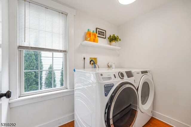 6 Highland Ave, Montville Twp, NJ 07045 - washroom with washing machine and clothes dryer, baseboards, and wood finished floors