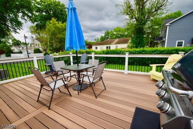 99 Mapes Ave, Springfield Twp, NJ 07081 - deck featuring outdoor dining area and a yard
