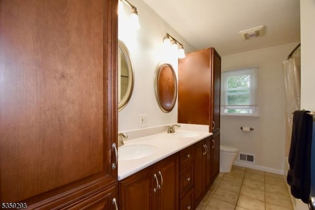 99 Mapes Ave, Springfield Twp, NJ 07081 - full bathroom with double vanity and tile patterned floors
