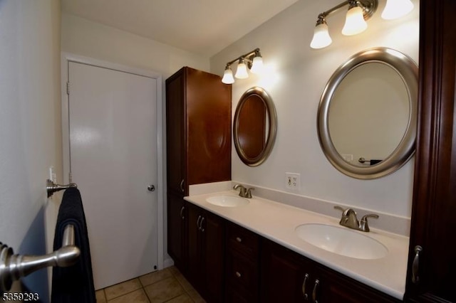 99 Mapes Ave, Springfield Twp, NJ 07081 - bathroom featuring double vanity and tile patterned flooring