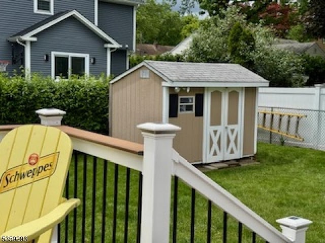 99 Mapes Ave, Springfield Twp, NJ 07081 - wooden deck with a storage shed
