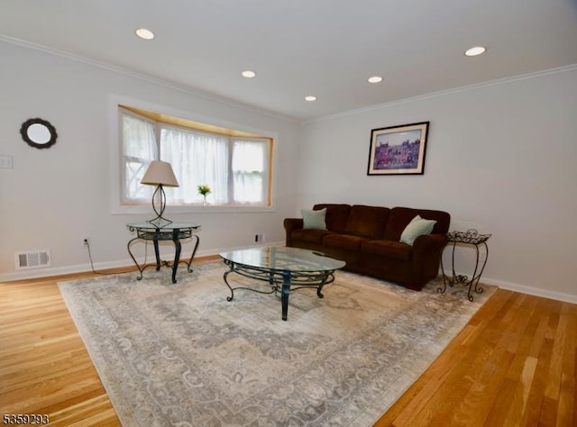 99 Mapes Ave, Springfield Twp, NJ 07081 - living room featuring ornamental molding, wood finished floors, and recessed lighting