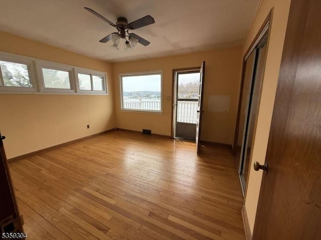 66 Ithanell Rd, Hopatcong Boro, NJ 07843 - unfurnished bedroom with light wood-style floors, baseboards, a closet, and access to outside