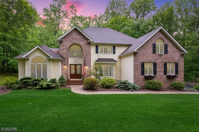 785 Backhus Estate Rd, Lebanon Twp, NJ 08826 - traditional-style home featuring a lawn, french doors, brick siding, and a shingled roof