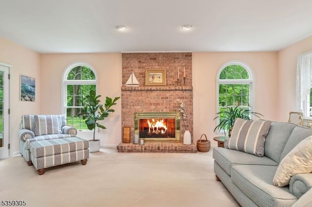 785 Backhus Estate Rd, Lebanon Twp, NJ 08826 - carpeted living room featuring a brick fireplace, healthy amount of natural light, and recessed lighting
