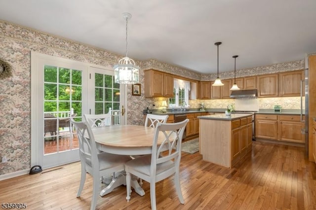 785 Backhus Estate Rd, Lebanon Twp, NJ 08826 - dining area with wallpapered walls and light wood-style floors