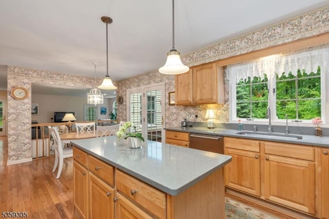 785 Backhus Estate Rd, Lebanon Twp, NJ 08826 - kitchen with a sink, stainless steel dishwasher, light wood finished floors, a kitchen island, and wallpapered walls