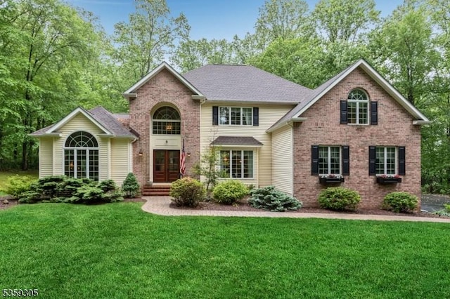 785 Backhus Estate Rd, Lebanon Twp, NJ 08826 - traditional-style home featuring a front lawn, brick siding, and roof with shingles