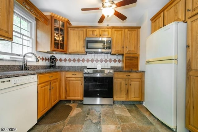 6 Gardenia Rd, Vernon Twp, NJ 07418 - kitchen featuring stainless steel appliances, decorative backsplash, dark stone finish flooring, a sink, and ceiling fan