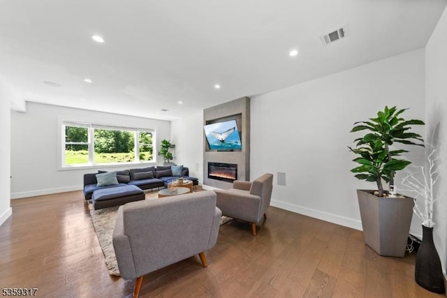 190 Riverside Dr, Springfield Twp, NJ 07081 - living area featuring a large fireplace, baseboards, wood finished floors, and recessed lighting
