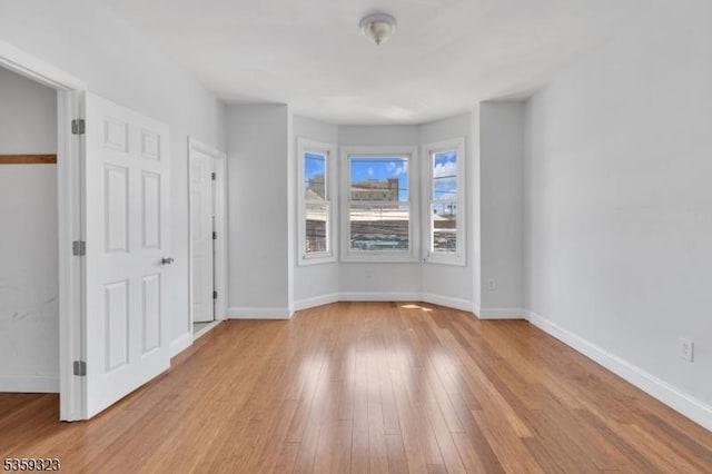 171 Sherman Ave, Newark City, NJ 07114 - spare room with wood finished floors and baseboards