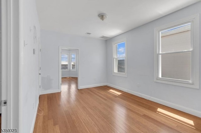171 Sherman Ave, Newark City, NJ 07114 - empty room with light wood finished floors and baseboards