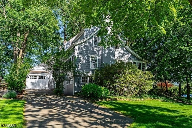 48 Baltusrol Way, Millburn Twp, NJ 07078 - view of front of house featuring concrete driveway and a front lawn