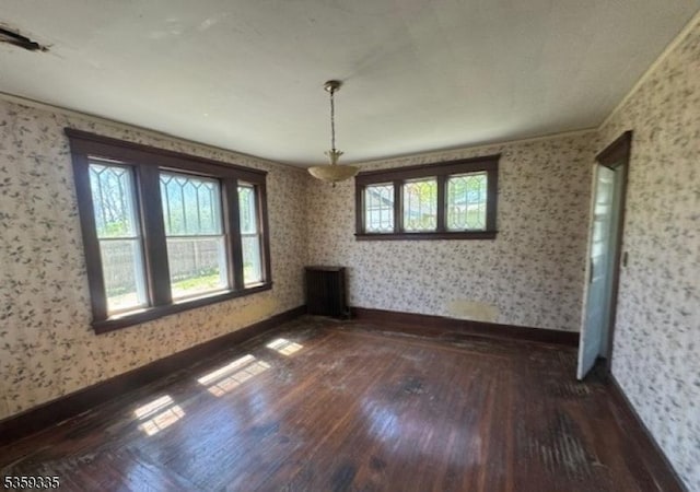 25 Prospect Ave, Andover Boro, NJ 07821 - unfurnished dining area with plenty of natural light, hardwood / wood-style flooring, wallpapered walls, and baseboards