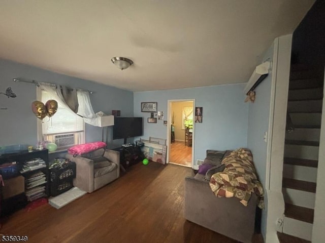 166 Fulton St, New Brunswick City, NJ 08901 - living area with wood finished floors and cooling unit