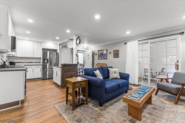 85 Smithfield Ct, Bernards Twp, NJ 07920 - living room featuring light wood-style floors, ornamental molding, and recessed lighting