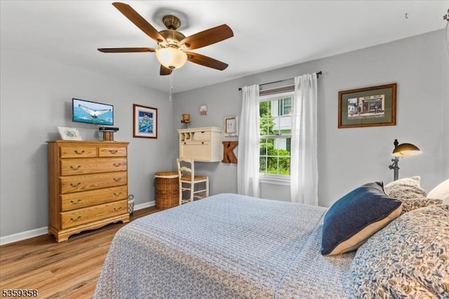 85 Smithfield Ct, Bernards Twp, NJ 07920 - bedroom with light wood finished floors, baseboards, and a ceiling fan