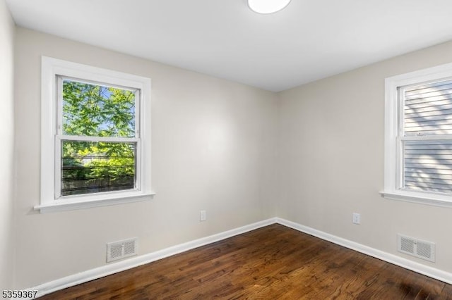 1190 Union St, Linden City, NJ 07036 - spare room featuring dark wood finished floors and baseboards