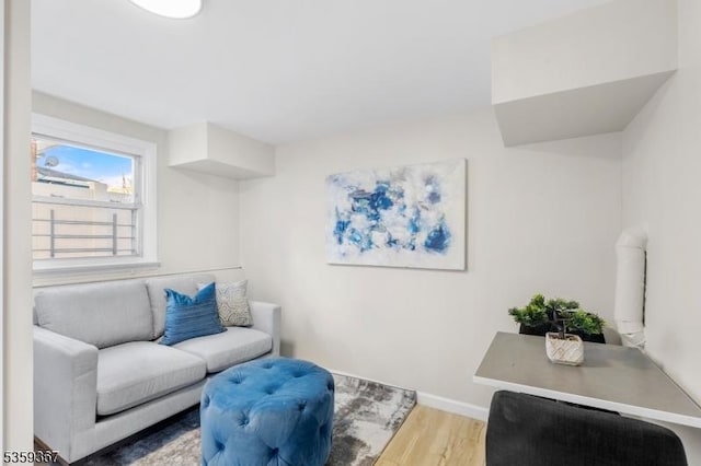 1190 Union St, Linden City, NJ 07036 - living area featuring wood finished floors and baseboards