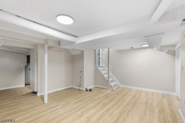 1190 Union St, Linden City, NJ 07036 - finished below grade area with baseboards, light wood-style flooring, and stairs