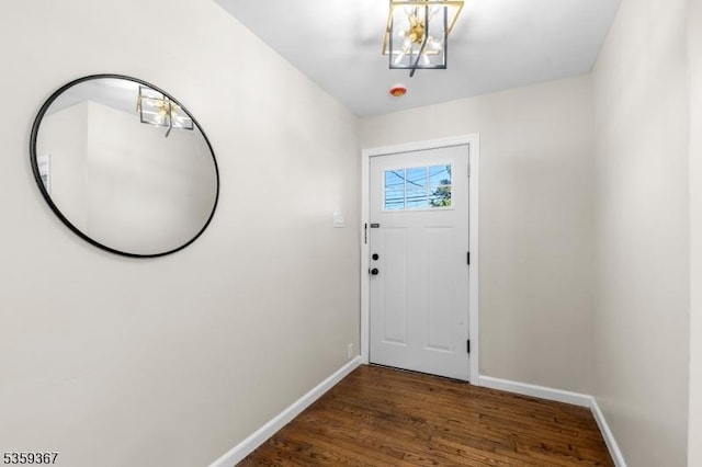1190 Union St, Linden City, NJ 07036 - entryway with baseboards, wood finished floors, and a chandelier