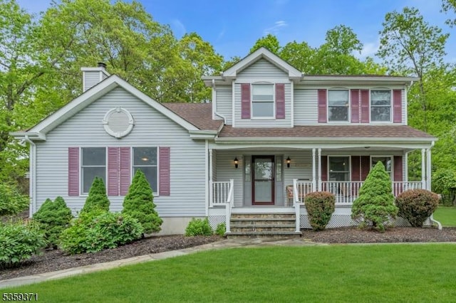 1 Lepont St, Stanhope Boro, NJ 07874 - view of front facade with a front lawn, a porch, a chimney, and a shingled roof