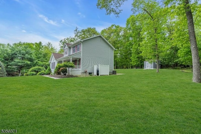 1 Lepont St, Stanhope Boro, NJ 07874 - view of home's exterior featuring a storage unit and a lawn