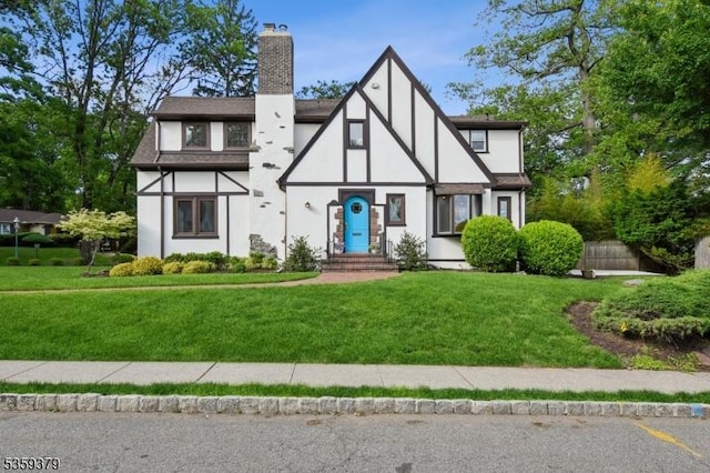 371 Franklin Pl S, Orange Village Twp, NJ 07079 - english style home featuring a chimney and stucco siding