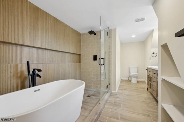 371 Franklin Pl S, Orange Village Twp, NJ 07079 - full bathroom with a freestanding bath, a stall shower, and vanity
