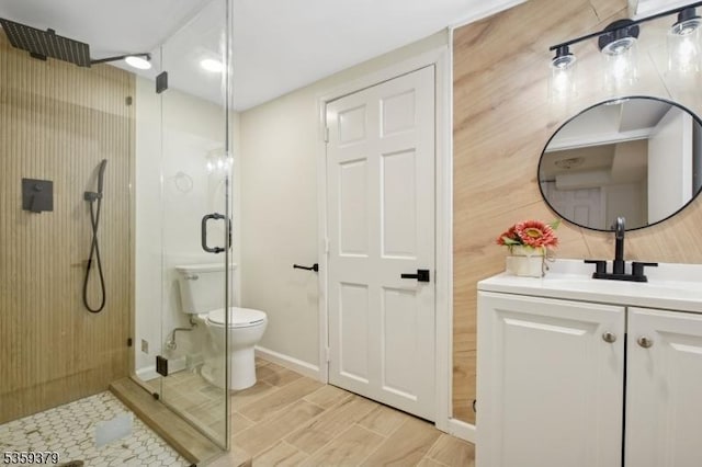 371 Franklin Pl S, Orange Village Twp, NJ 07079 - bathroom featuring a shower stall, vanity, and wood finished floors