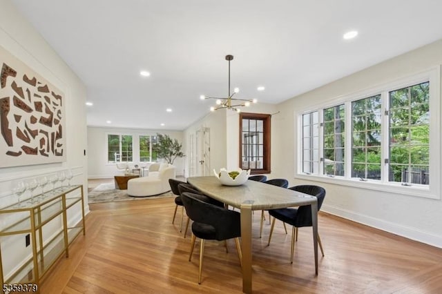 371 Franklin Pl S, Orange Village Twp, NJ 07079 - dining area with recessed lighting, a chandelier, and parquet floors