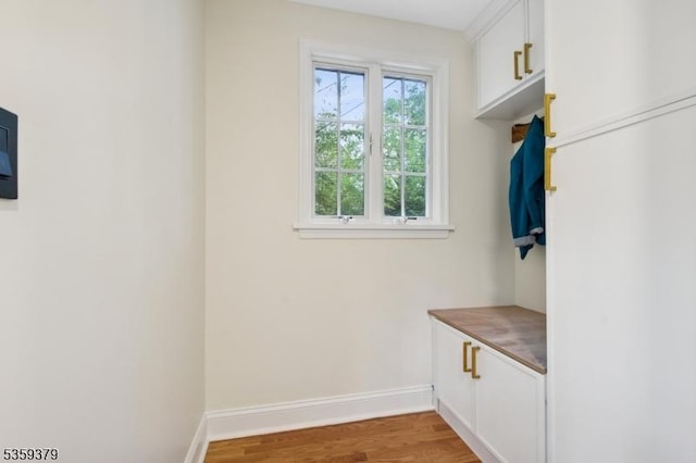 371 Franklin Pl S, Orange Village Twp, NJ 07079 - mudroom featuring baseboards and wood finished floors