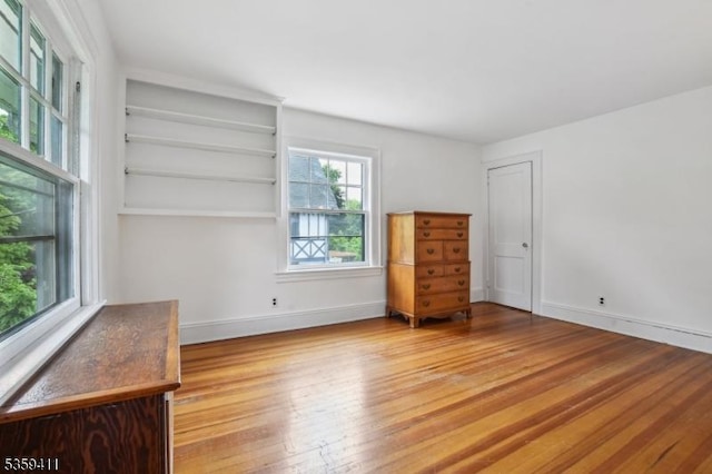 129 Severin Ct, Cranford Twp, NJ 07016 - unfurnished bedroom featuring light wood-style flooring and baseboards