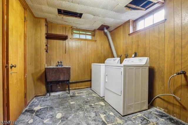 129 Severin Ct, Cranford Twp, NJ 07016 - washroom with separate washer and dryer and wood walls