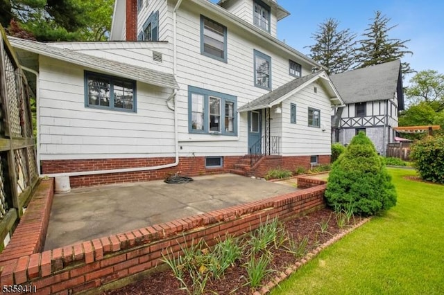 129 Severin Ct, Cranford Twp, NJ 07016 - back of property with a patio area and a yard