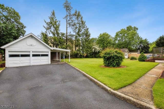 129 Severin Ct, Cranford Twp, NJ 07016 - view of front of house with a front yard, a garage, and view of scattered trees