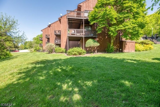 2 Sunrise Dr Unit 6, Vernon Twp, NJ 07462 - rear view of house featuring a lawn and a deck
