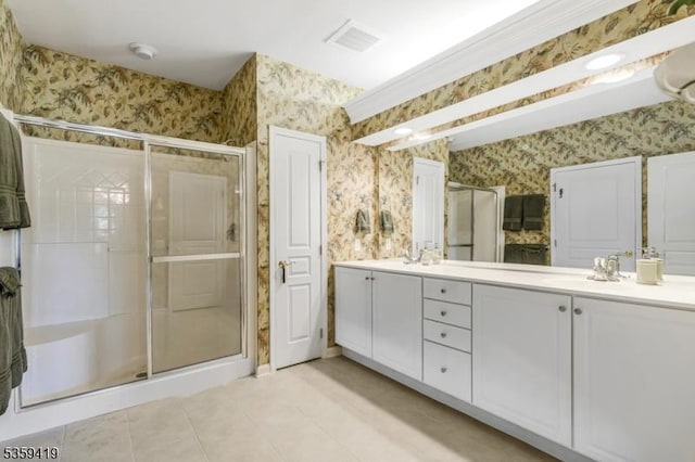 6302 Westover Way Unit 6302, Franklin Twp, NJ 08873 - bathroom featuring wallpapered walls, double vanity, a shower stall, and tile patterned floors