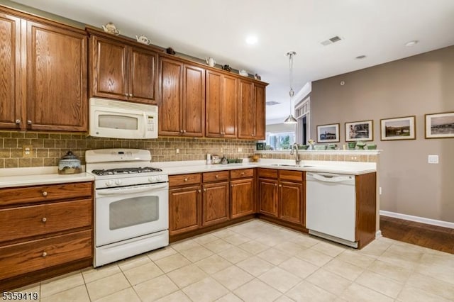 6302 Westover Way Unit 6302, Franklin Twp, NJ 08873 - kitchen featuring white appliances, a sink, light countertops, brown cabinets, and recessed lighting