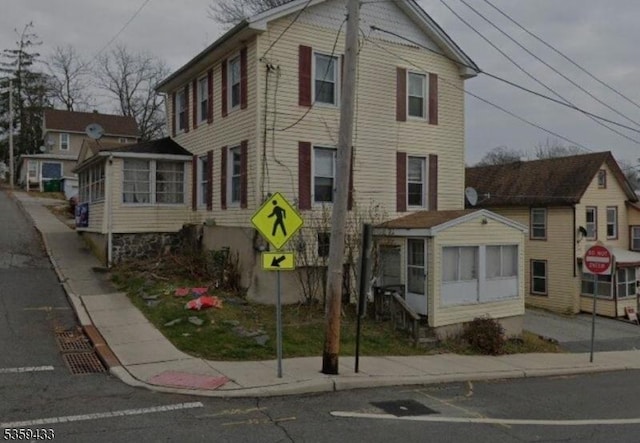 2-8 Harrison St, Sussex Boro, NJ 07461 - view of front of house featuring a sunroom