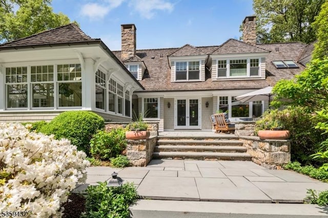 259 Indian Trail Dr, Franklin Lakes Boro, NJ 07417 - back of house featuring french doors and a chimney