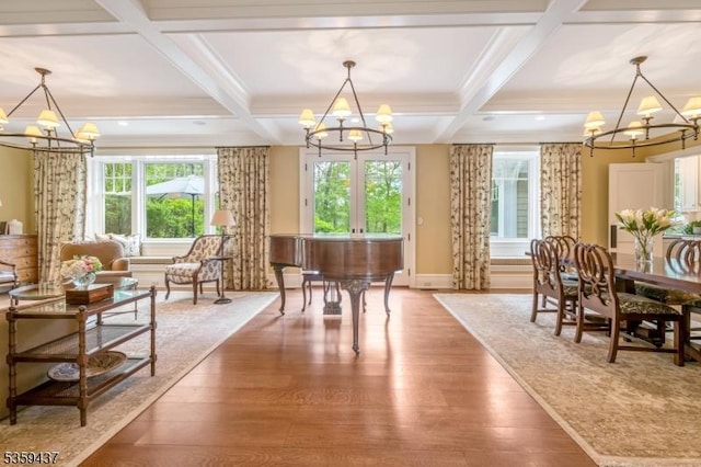 259 Indian Trail Dr, Franklin Lakes Boro, NJ 07417 - dining room with a chandelier, coffered ceiling, wood finished floors, beamed ceiling, and french doors