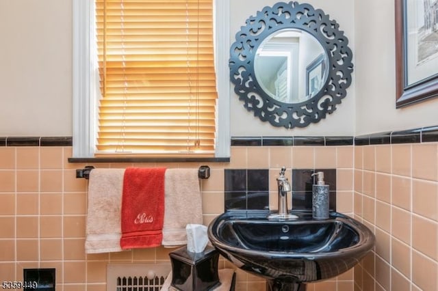 947 Madison Ave, Plainfield City, NJ 07060 - bathroom featuring a sink and tile walls