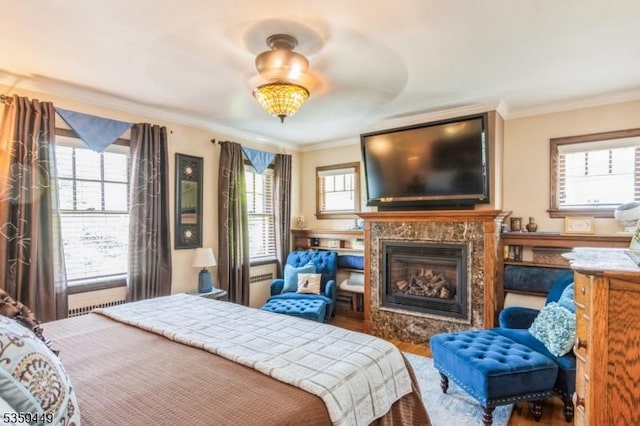 947 Madison Ave, Plainfield City, NJ 07060 - bedroom with crown molding, a fireplace, and wood finished floors