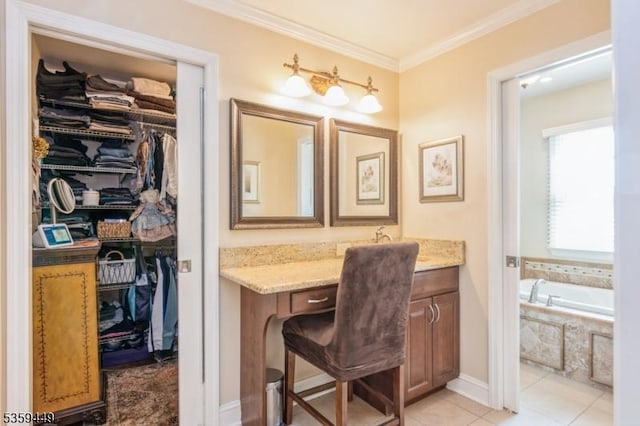947 Madison Ave, Plainfield City, NJ 07060 - bathroom with vanity, a bath, ornamental molding, a walk in closet, and tile patterned floors