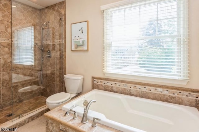 947 Madison Ave, Plainfield City, NJ 07060 - bathroom featuring toilet, a garden tub, healthy amount of natural light, and a tile shower