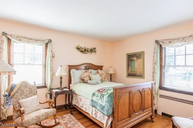 947 Madison Ave, Plainfield City, NJ 07060 - bedroom featuring radiator heating unit and light wood-style floors