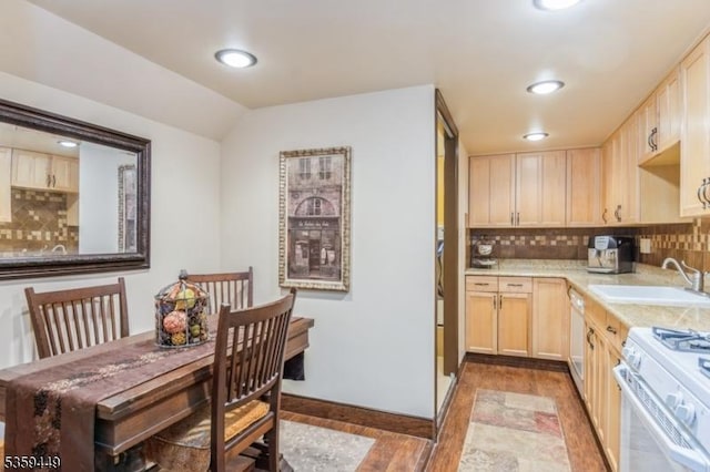 947 Madison Ave, Plainfield City, NJ 07060 - kitchen with a sink, light brown cabinets, wood finished floors, backsplash, and vaulted ceiling