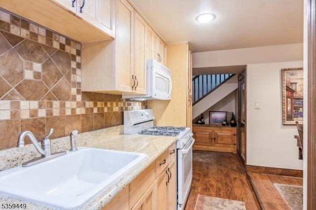 947 Madison Ave, Plainfield City, NJ 07060 - kitchen with white appliances, a sink, dark wood finished floors, tasteful backsplash, and baseboards
